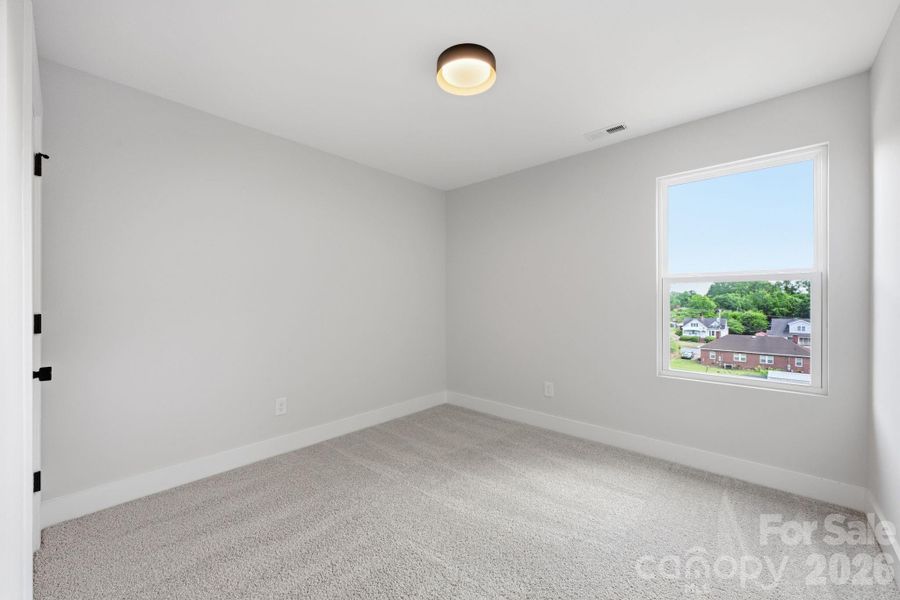 Spacious, unfurnished interior of a new home in , Albemarle (Image 12).