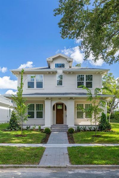 Front exterior of a new home in , St. Petersburg, FL, highlighting curb appeal (Image 22). Front exterior of a new home in , St. Petersburg, FL, highlighting curb appeal (Image 22).