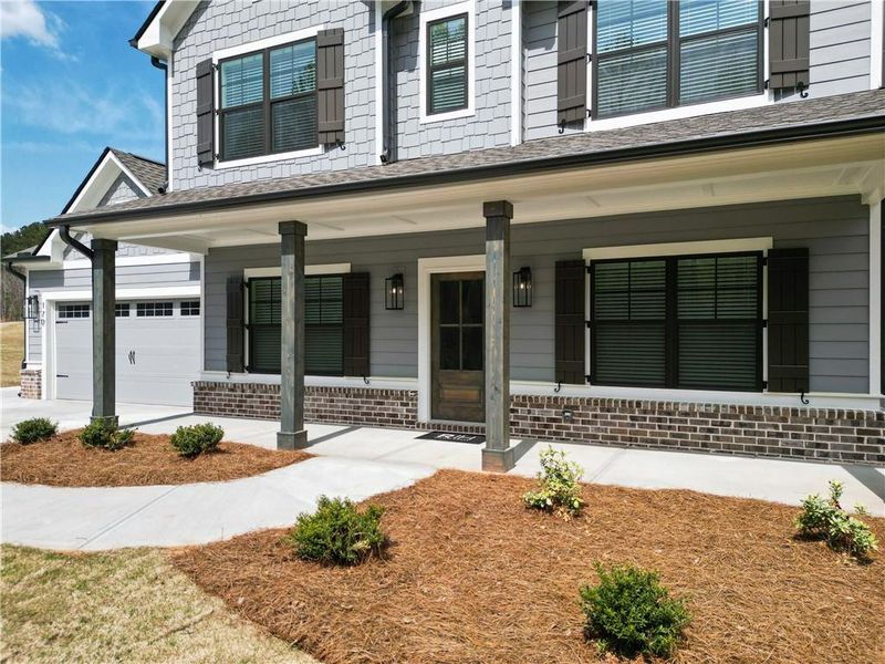 Exterior details and patio area of a home in Weslyn Park, Social Circle (Image 3).