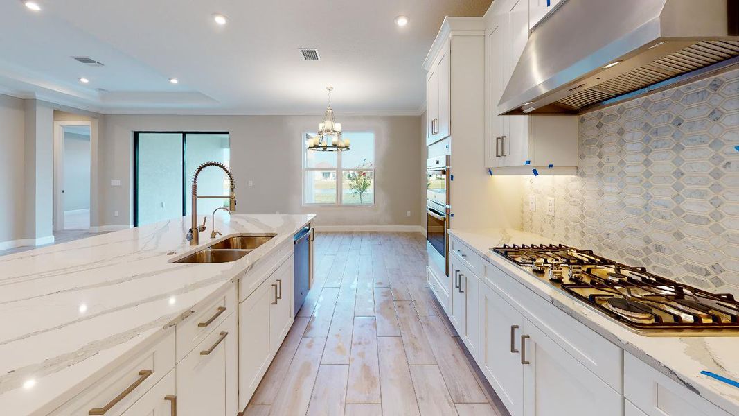 Representative furnished interior of a home built from the Azzurro by Taylor Morrison in Esplanade by the Islands, Naples (Image 8).