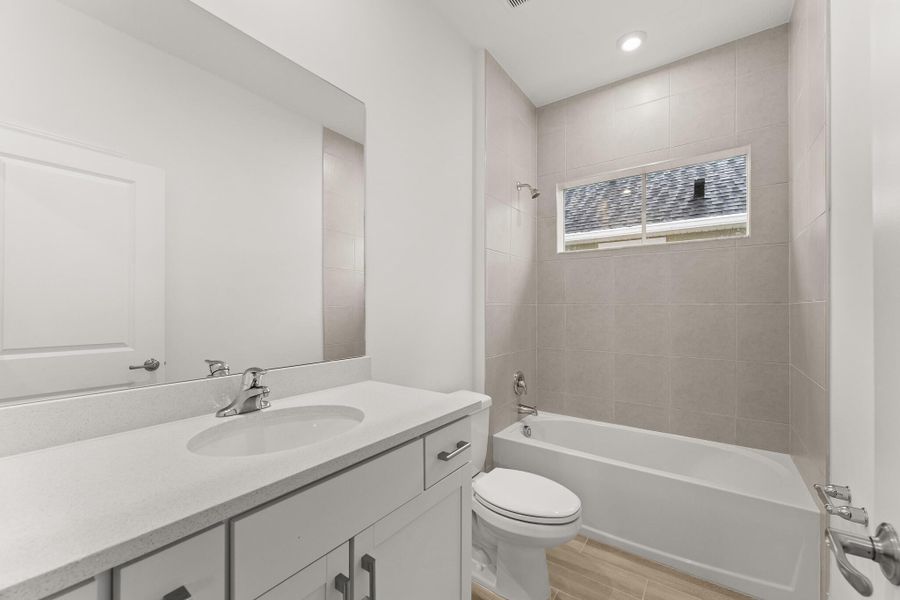 Furnished interior view inside a new home in Newfield - Rosette Park, Palm City (Image 7). Furnished interior view inside a new home in Newfield - Rosette Park, Palm City (Image 7).