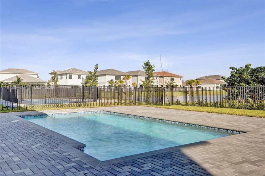 Exterior details and patio area of a home in Apex at Avenir, Palm Beach Gardens (Image 33).