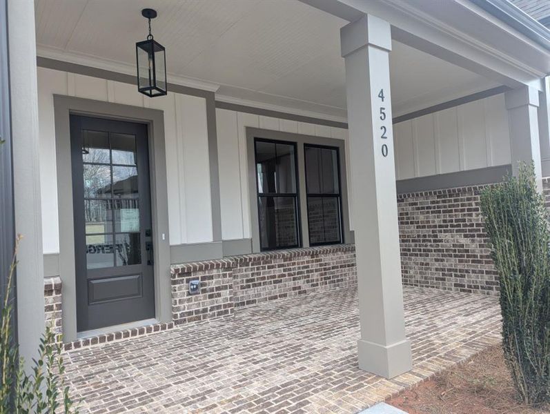 Exterior details and patio area of a home in Arden on Lanier, Cumming (Image 3).