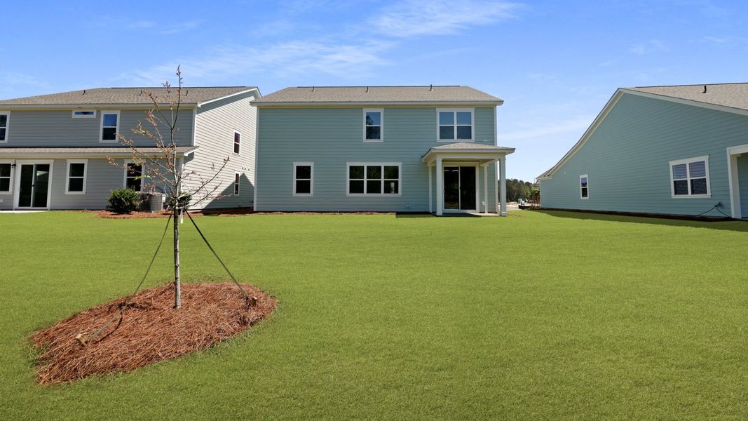 Front exterior of a new home in Sheep Island, Summerville, SC, highlighting curb appeal (Image 21).