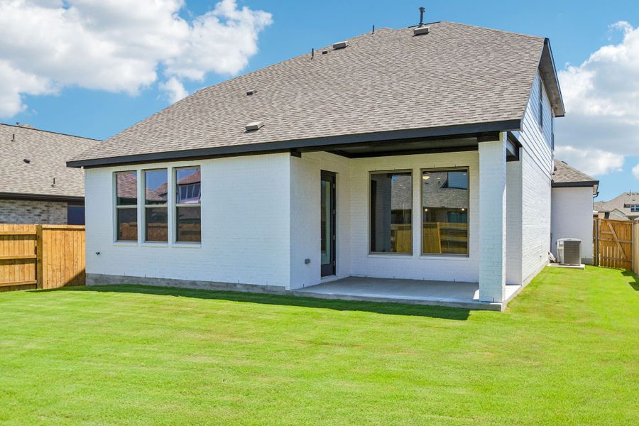 Exterior details and patio area of a home in 6 Creeks, Kyle (Image 18).