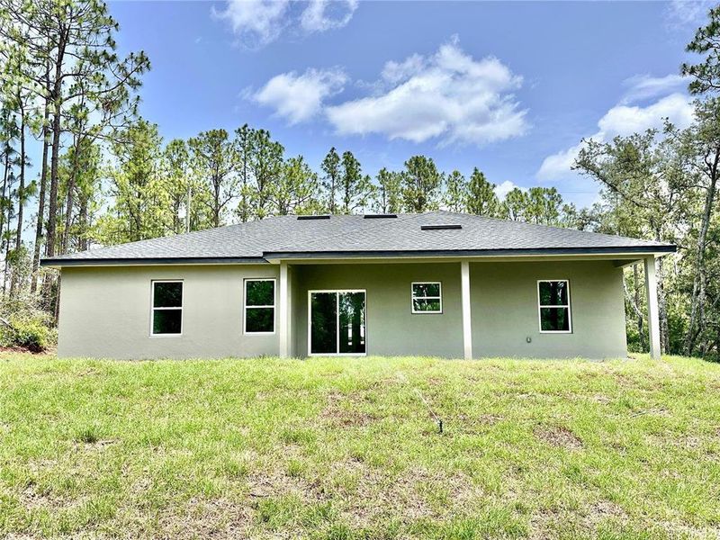 Exterior details and patio area of a home in , Citrus Springs (Image 19).