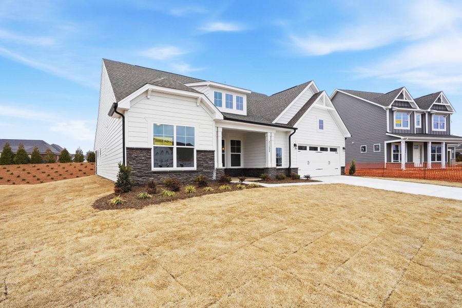 Front exterior of a new home in Harmony, Harrisburg, NC, highlighting curb appeal (Image 29).