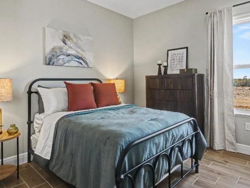 Furnished interior view inside a new home in Lake Deer Estates, Poinciana (Image 25).