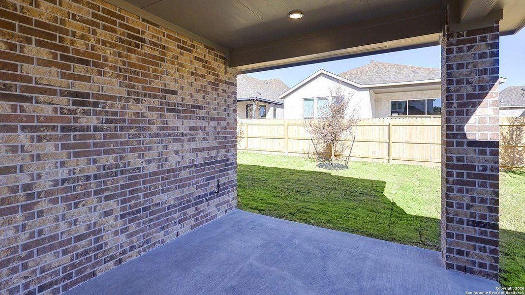 Exterior details and patio area of a home in Corley Farms 50', Boerne (Image 3).
