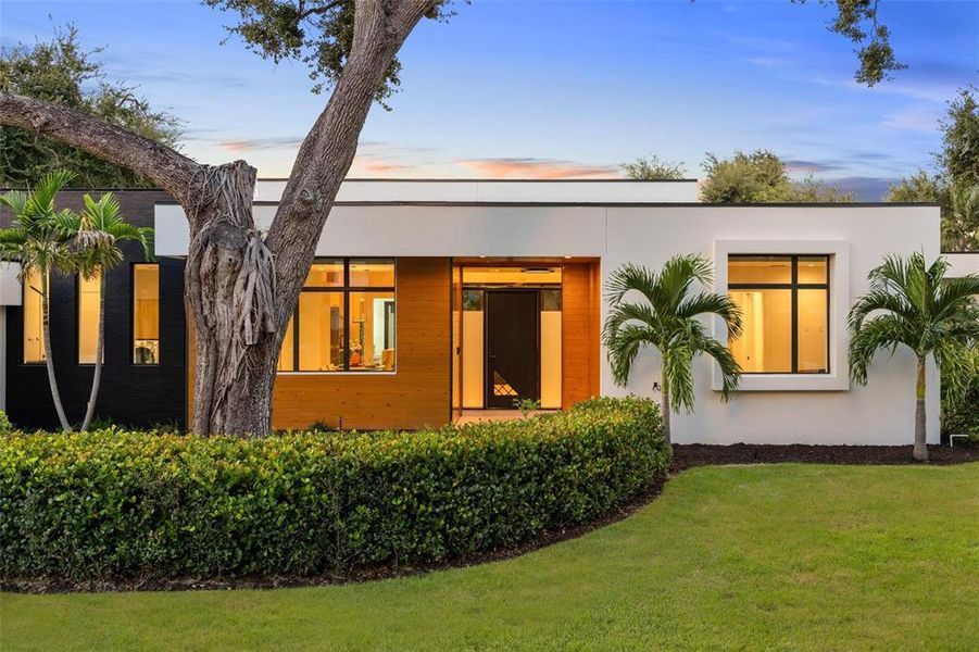 Front exterior of a new home in , Sarasota, FL, highlighting curb appeal (Image 35).