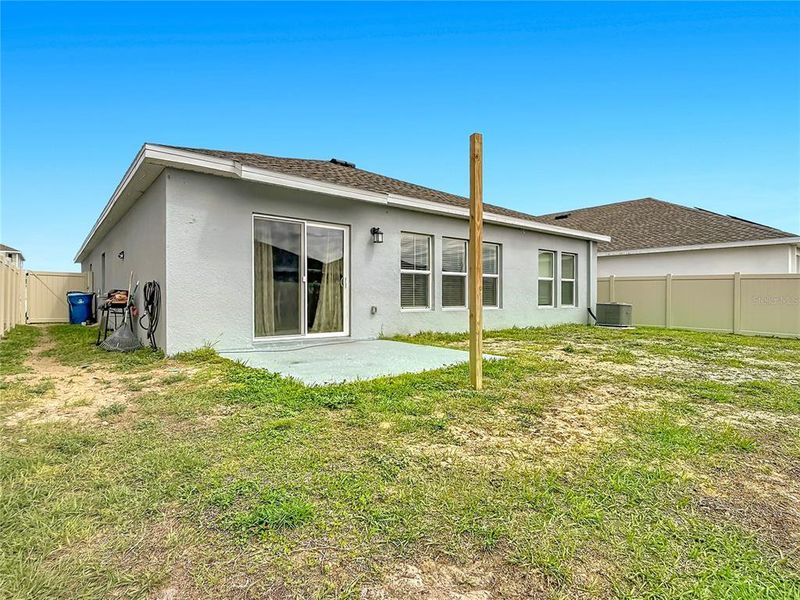 Exterior details and patio area of a home in , Haines City (Image 25).