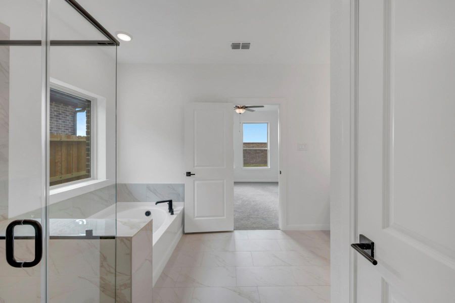 Furnished interior view inside a new home in Beacon Point at Lago Mar 50’ Homesites, Texas City (Image 11).