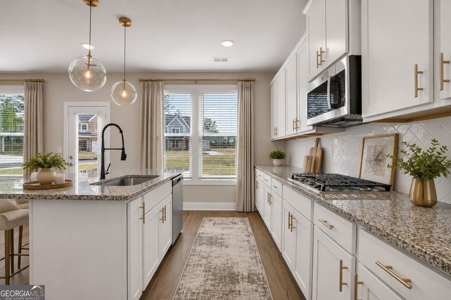Furnished interior view inside a new home in The Fairways at Mirror Lake, Villa Rica (Image 40).