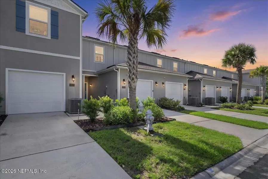 Front exterior of a new home in , Middleburg, FL, highlighting curb appeal (Image 1). Front exterior of a new home in , Middleburg, FL, highlighting curb appeal (Image 1).