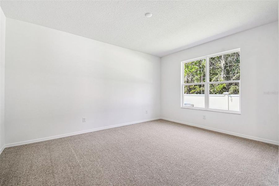 Spacious, unfurnished interior of a new home in Cascades at Southern Hills, Brooksville (Image 50).