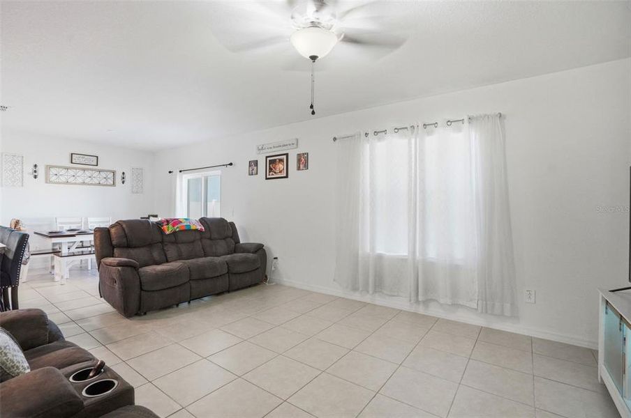 Furnished interior view inside a new home in The Isle of Avalon, Spring Hill (Image 10).