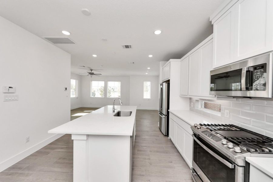 Furnished interior view inside a new home in Sienna, Missouri City (Image 12).
