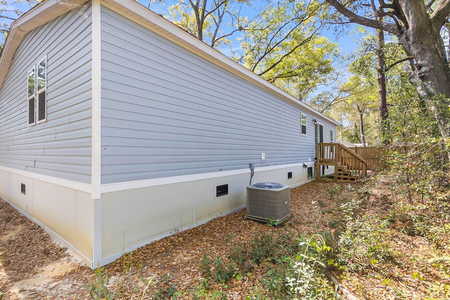 Exterior details and patio area of a home in , Summerville (Image 23).