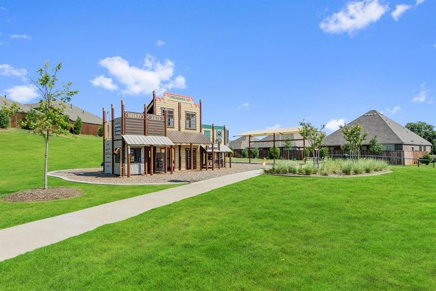 Front exterior of a new home in Timberbrook, Justin, TX, highlighting curb appeal (Image 17).