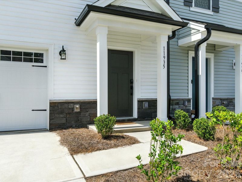 Exterior details and patio area of a home in The Landings at Catawba River, Charlotte (Image 3).