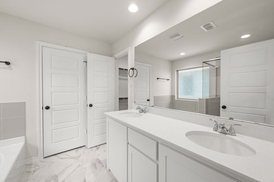 Front exterior of a new home in Baker Farms, Cleburne, TX, highlighting curb appeal (Image 2). Front exterior of a new home in Baker Farms, Cleburne, TX, highlighting curb appeal (Image 2).