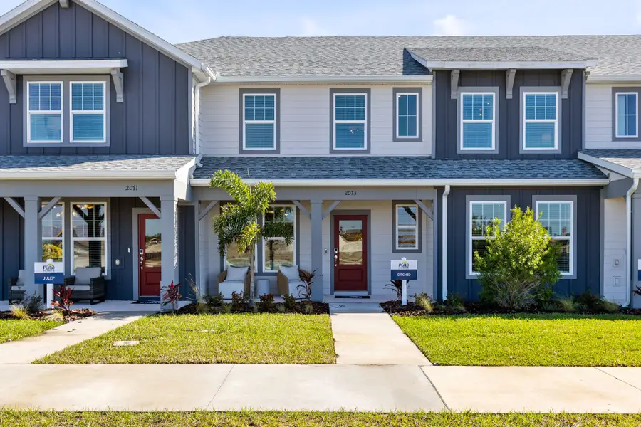 Front exterior of a new home in Tohoqua, Kissimmee, FL, highlighting curb appeal (Image 1). Front exterior of a new home in Tohoqua, Kissimmee, FL, highlighting curb appeal (Image 1).