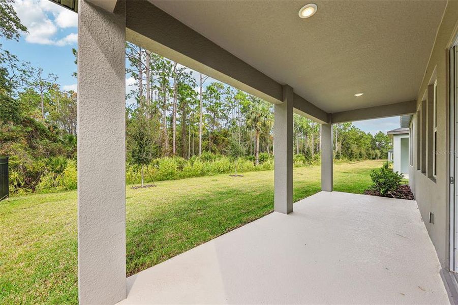 Exterior details and patio area of a home in , Ormond Beach (Image 26).