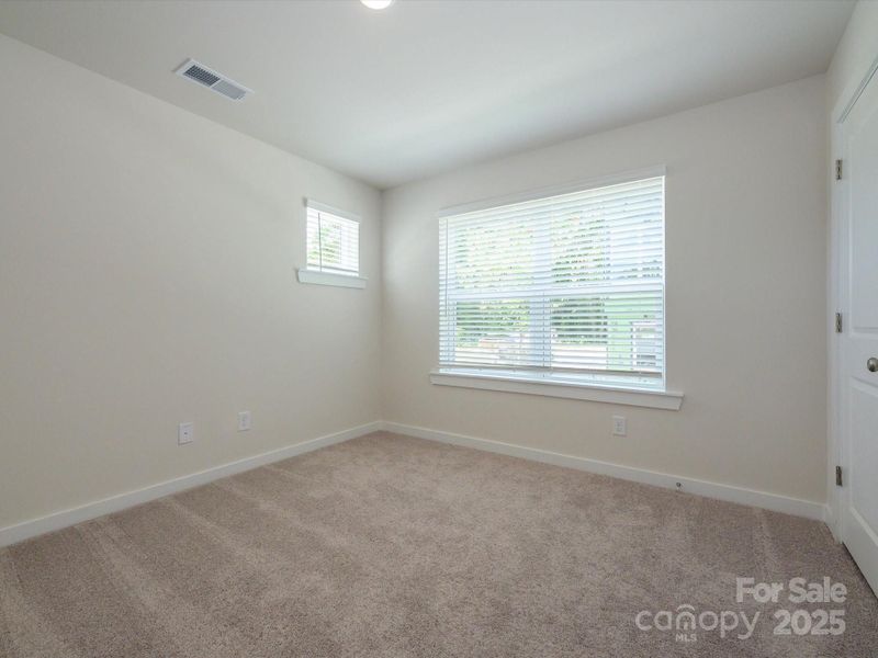 Spacious, unfurnished interior of a new home in Central Living at Craig, Charlotte (Image 17).