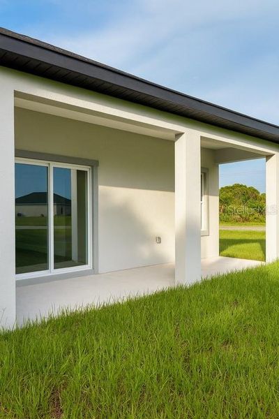 Front exterior of a new home in , Palm Bay, FL, highlighting curb appeal (Image 1). Front exterior of a new home in , Palm Bay, FL, highlighting curb appeal (Image 1).