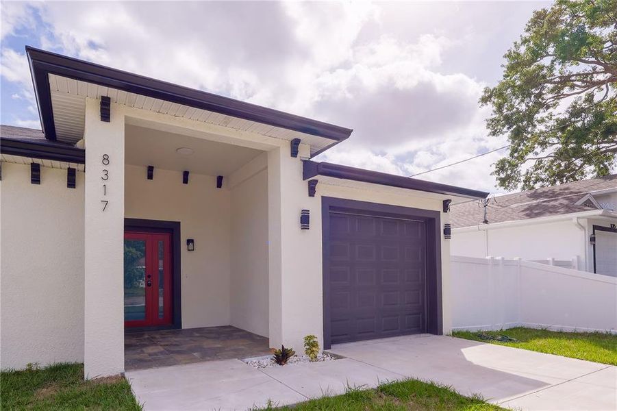 Front exterior of a new home in , Tampa, FL, highlighting curb appeal (Image 28). Front exterior of a new home in , Tampa, FL, highlighting curb appeal (Image 28).