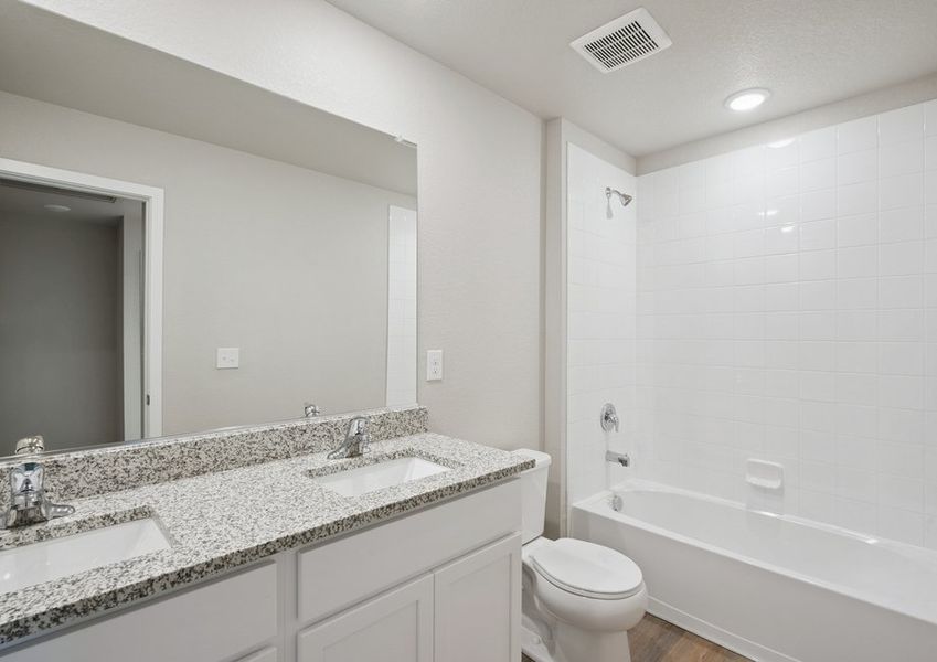 The secondary bathroom has a tub/shower combo.