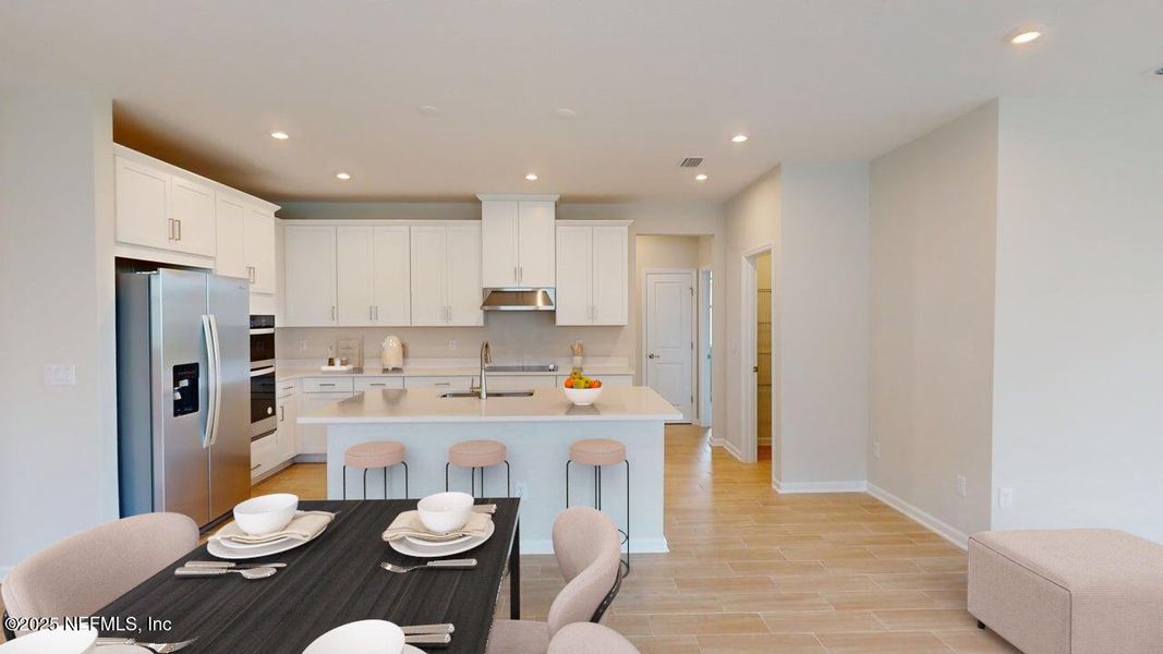 Furnished interior view inside a new home in Lakes at Bella Lago, Green Cove Springs (Image 5).