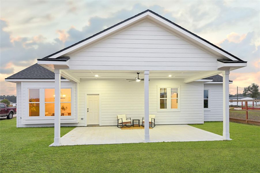 Exterior details and patio area of a home in , Huffman (Image 3). Exterior details and patio area of a home in , Huffman (Image 3).