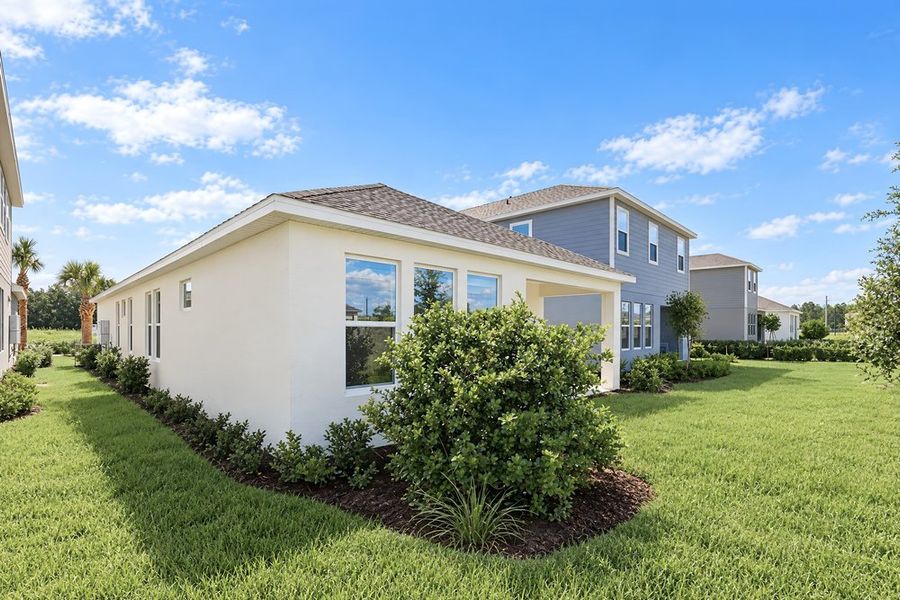 Exterior details and patio area of a home in Lochside, Mount Dora (Image 26). Exterior details and patio area of a home in Lochside, Mount Dora (Image 26).