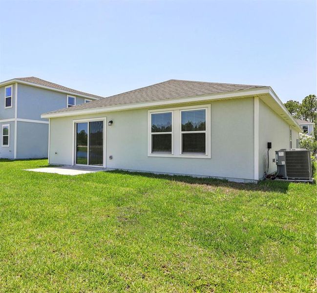 Exterior details and patio area of a home in Flagler Village - Classic Series, Palm Coast (Image 3).