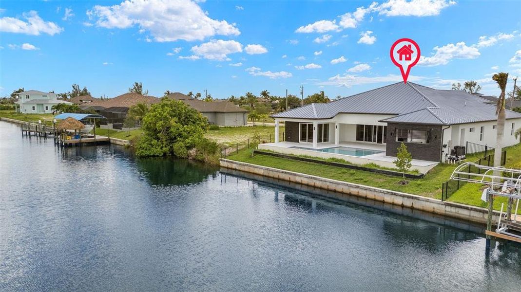 Front exterior of a new home in , Cape Coral, FL, highlighting curb appeal (Image 28). Front exterior of a new home in , Cape Coral, FL, highlighting curb appeal (Image 28).