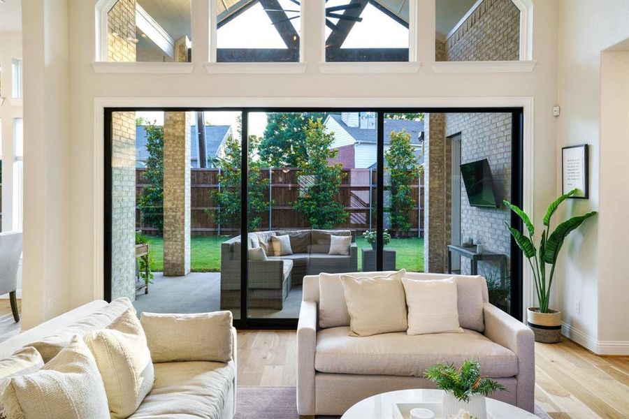 Outdoor Living Connection - Enjoy effortless indoor-outdoor flow with 15-foot sliding glass doors that open wide to the covered patio and backyard retreat. Outdoor Living Connection - Enjoy effortless indoor-outdoor flow with 15-foot sliding glass doors that open wide to the covered patio and backyard retreat.