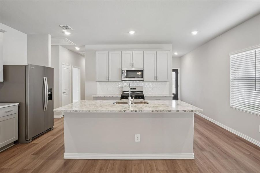 Photo is not of the actual home, but is an inspirational photo of builder’s model home and may depict options, furnishings, and/or decorator features that are not included.