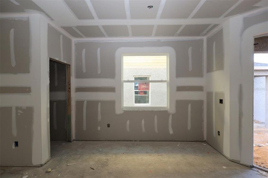 In-progress construction of a new home in Lake Star at Ovation, Winter Garden, FL (Image 20).