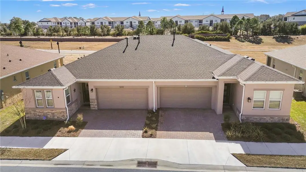 Front exterior of a new home in , Ocala, FL, highlighting curb appeal (Image 2). Front exterior of a new home in , Ocala, FL, highlighting curb appeal (Image 2).