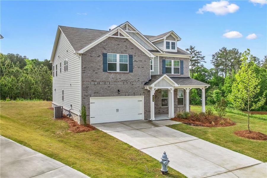Front exterior of a new home in , Lawrenceville, GA, highlighting curb appeal (Image 26).