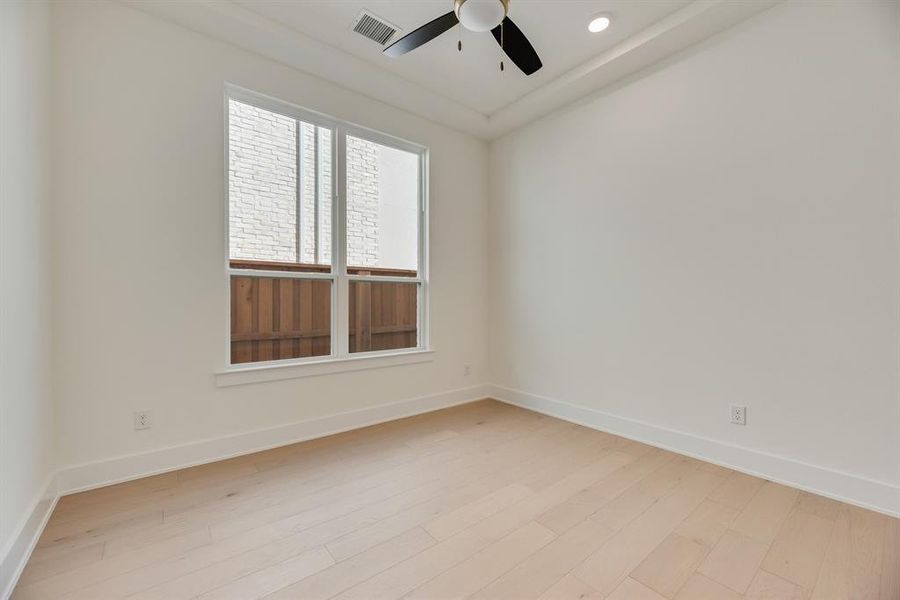 Unfurnished room featuring light wood-type flooring, recessed lighting, and ceiling fan Unfurnished room featuring light wood-type flooring, recessed lighting, and ceiling fan