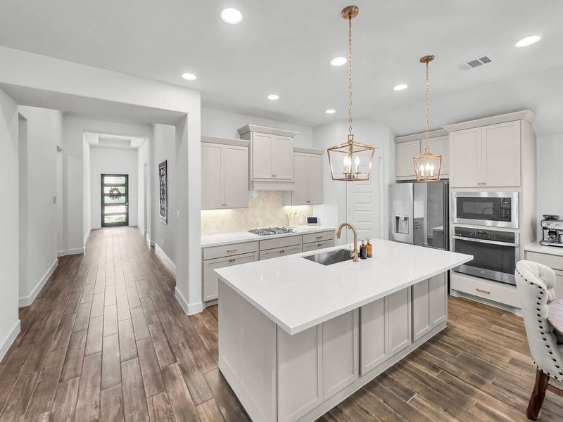 Furnished interior view inside a new home in Artavia, Conroe (Image 36).