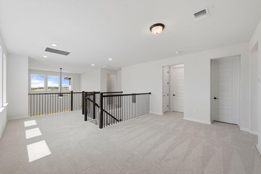 Spacious, unfurnished interior of a new home in Terrace Collection At Turner's Crossing, Buda (Image 24).