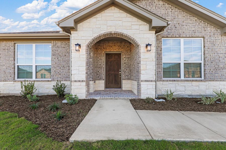 Representative exterior photo of a completed home built from the Garrison I by Cheldan Homes in Stoneview, Glen Rose, TX (Image 29).