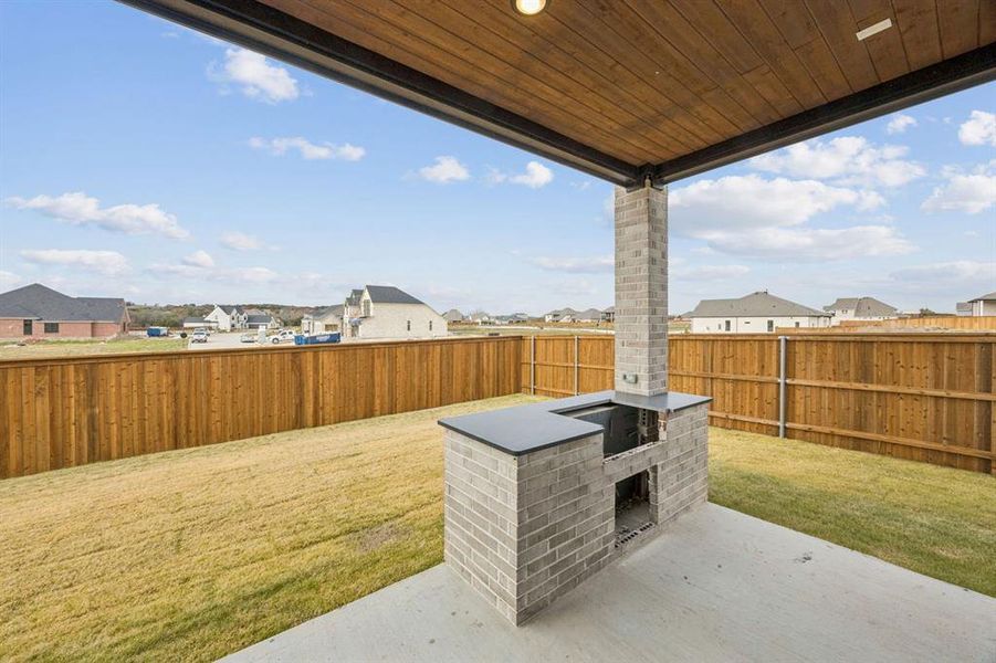 Exterior details and patio area of a home in Rio Vista at Kelly Ranch, Aledo (Image 13).