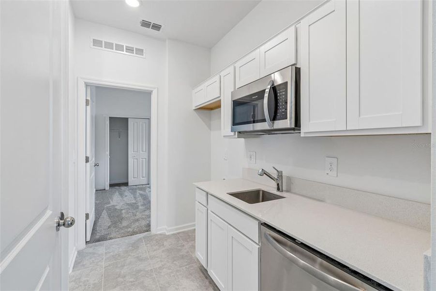 Furnished interior view inside a new home in Peace Creek Reserve, Winter Haven (Image 25).