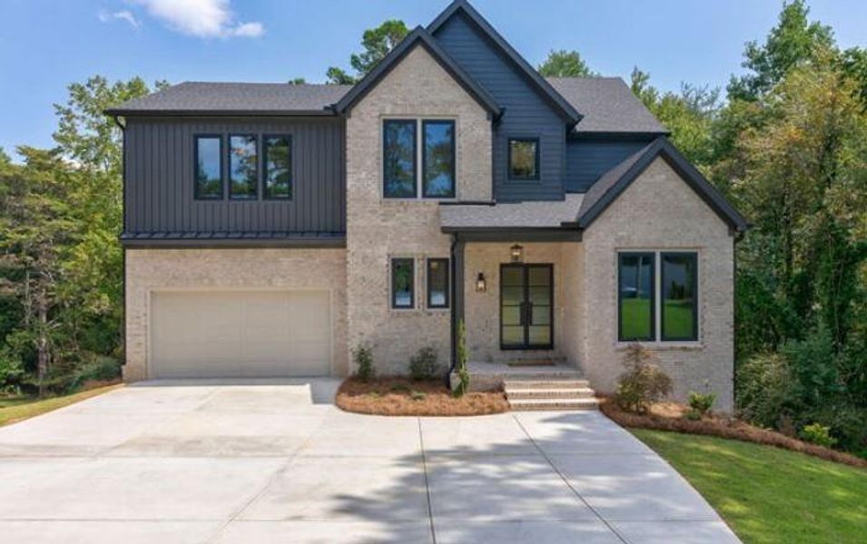Front exterior of a new home in , Cumming, GA, highlighting curb appeal (Image 28). Front exterior of a new home in , Cumming, GA, highlighting curb appeal (Image 28).
