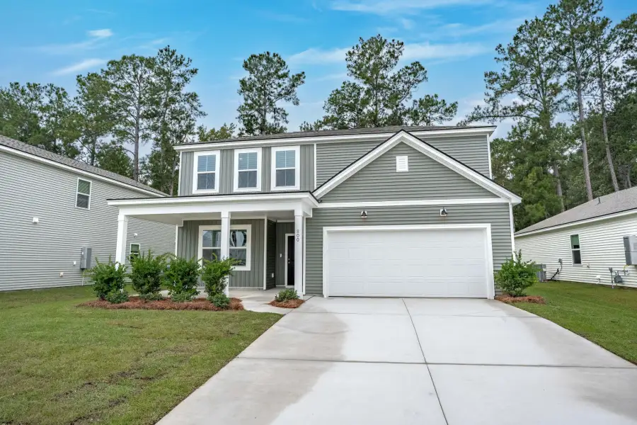 Front exterior of a new home in Bradford Pointe, Summerville, SC, highlighting curb appeal (Image 17).