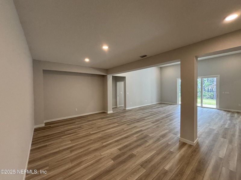 Spacious, unfurnished interior of a new home in The Cypress Series at Reserve East, Flagler Beach (Image 28).